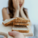 Stressed person in front of bread
