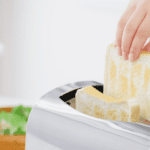 Pulling Bread out of Toaster